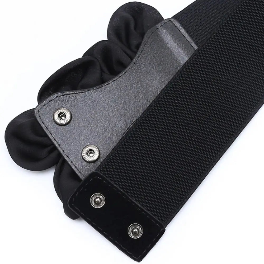 Blommigt elastiskt midjebälte – feminin detalj med trendig touch